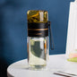 "InfuseMate" Glass water bottle - Leakproof double wall with tea filter & infuser